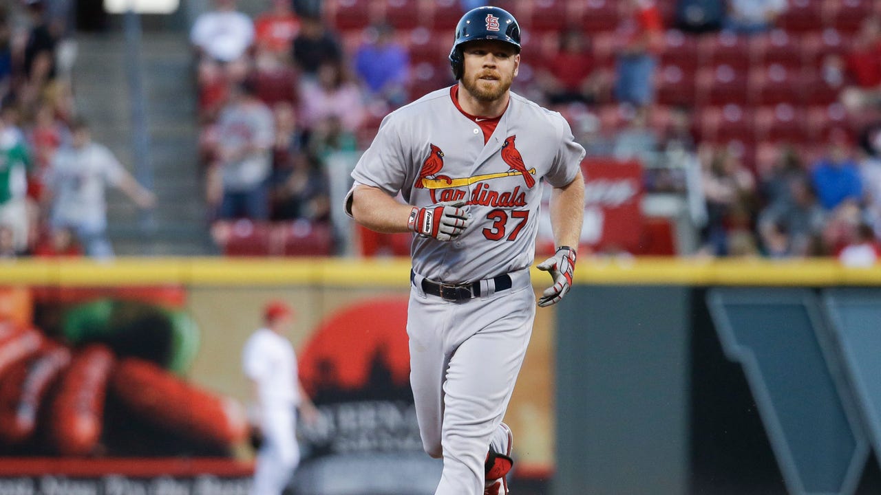 Boom! Two home runs from Moss help Cards sail past Reds 12-7